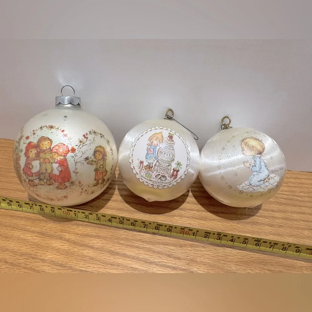 Vintage hallmark Ornament bulbs dated 1974, 1975, 1976